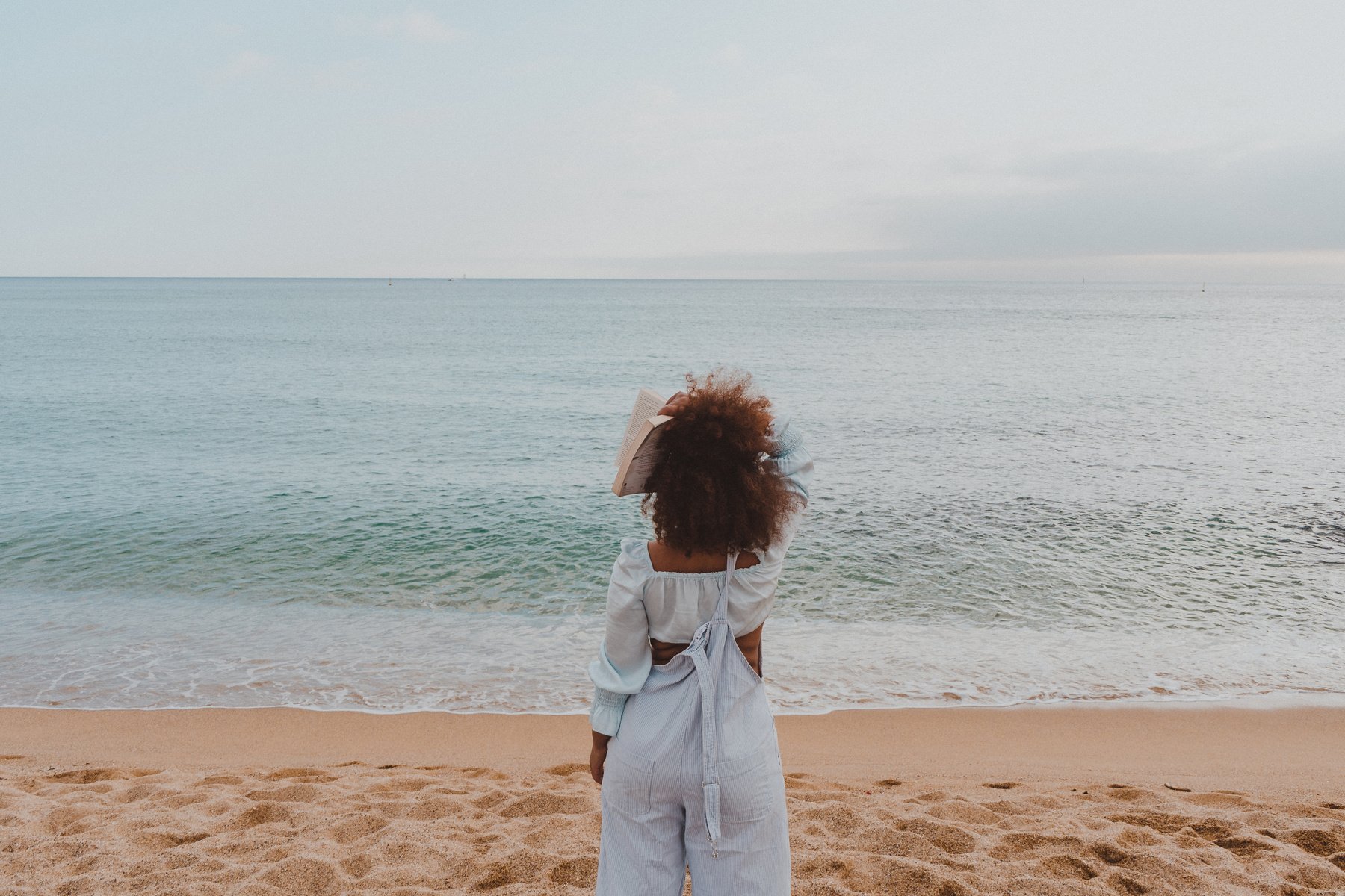 Woman Looking at the Beach